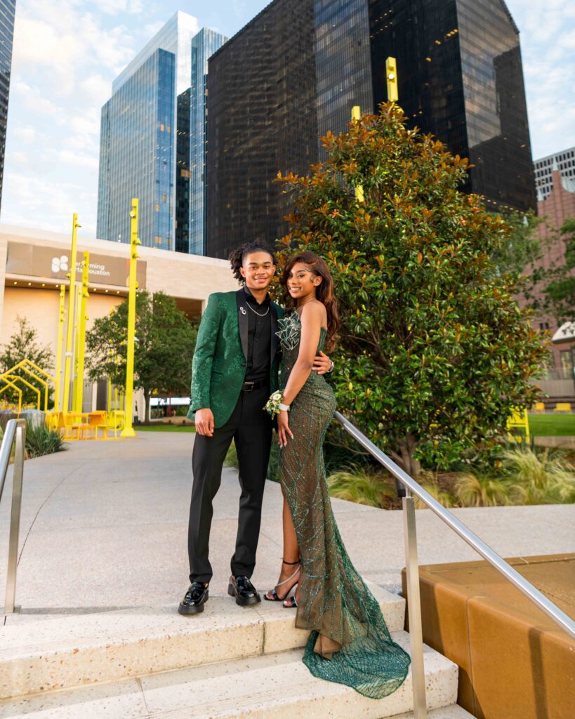 High-end prom couple portraits with the Houston TX city skyline background.
